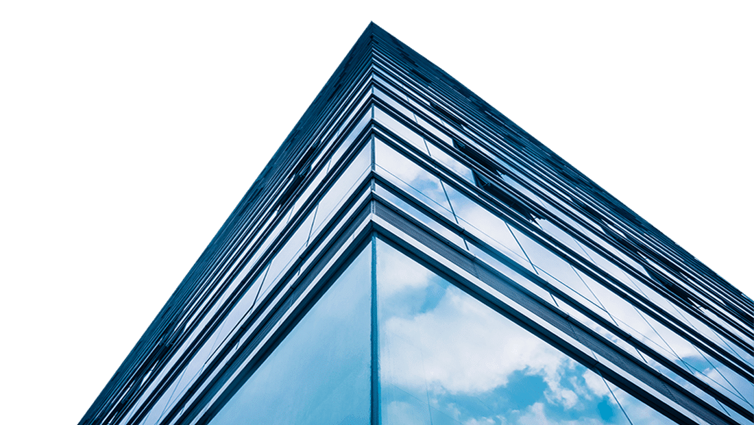 Modern glass skyscraper reflecting blue sky. Ideal image for Commercial Window Cleaning in Portland OR, showcasing the importance of clean windows for building aesthetics.