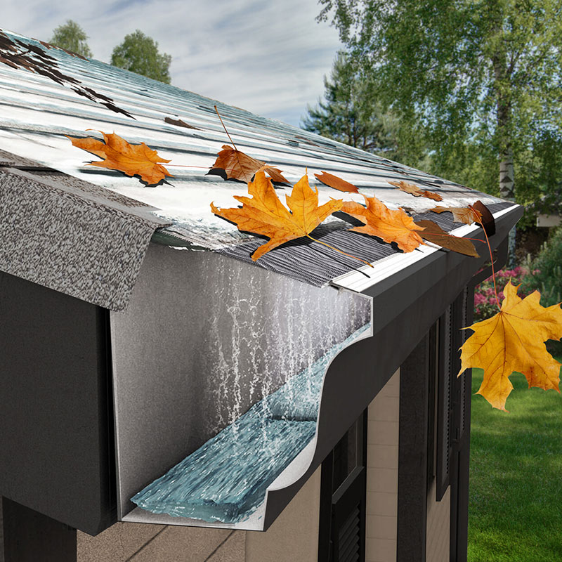 Close-up of a gutter guard installation on a house, showing water flowing through the guard and into the gutter, while leaves remain on top. This protects the gutter from clogging.